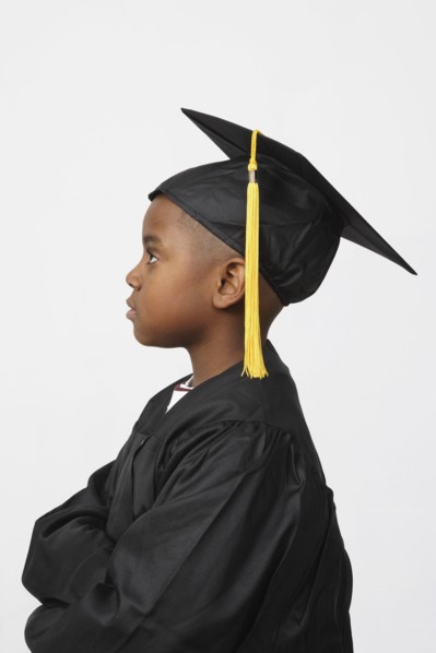 African boy wearing cap and gown