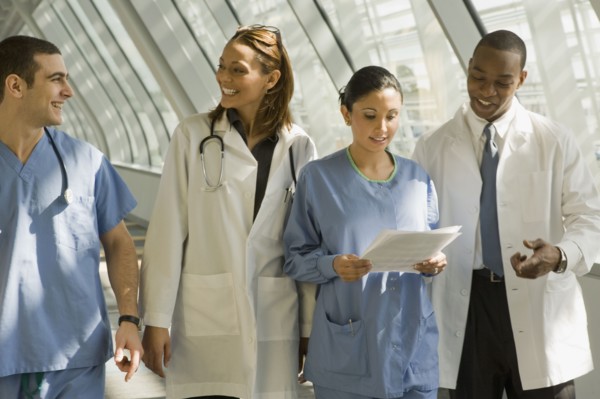 Multi-ethnic doctors and nurses in corridor