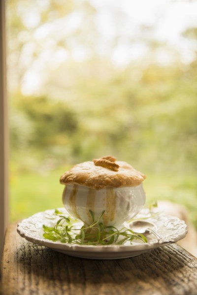 Plate of baked pie and herbs