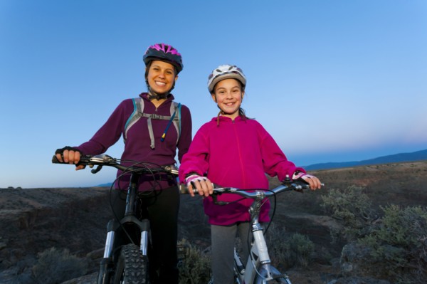 Sisters mountain biking together