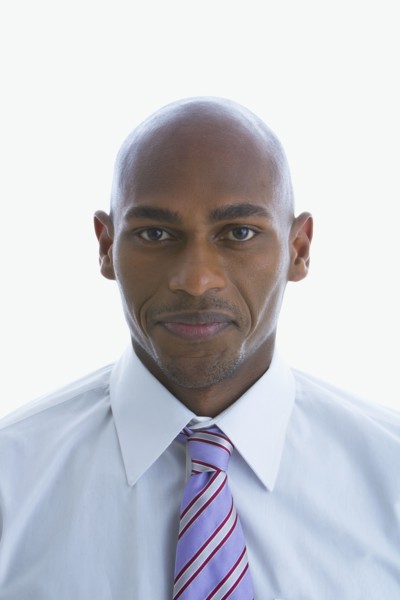 Mixed race businessman smiling