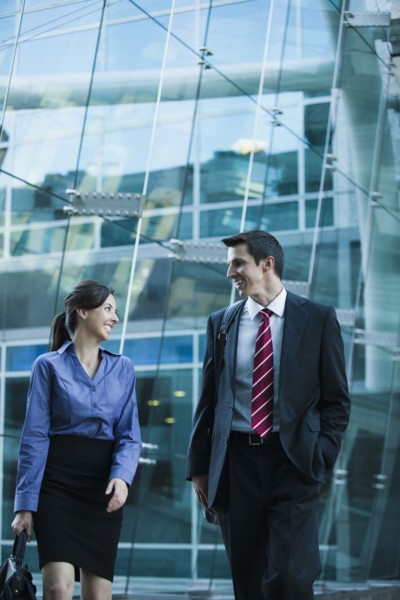 Caucasian business people walking together outdoors