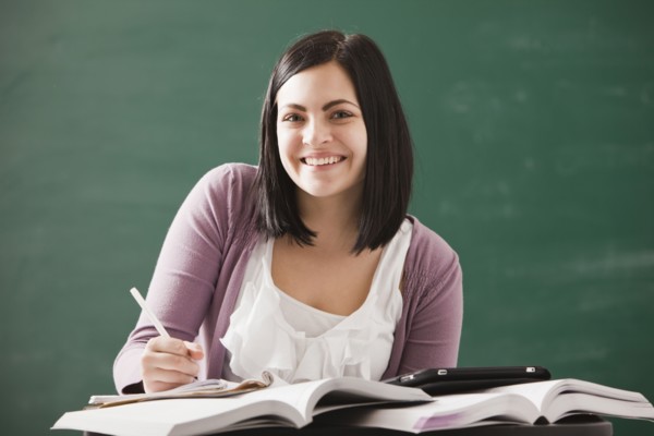 Caucasian student doing homework