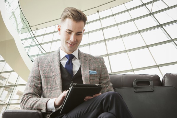Caucasian businessman using digital tablet