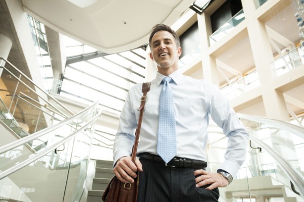 Caucasian businessman on office steps