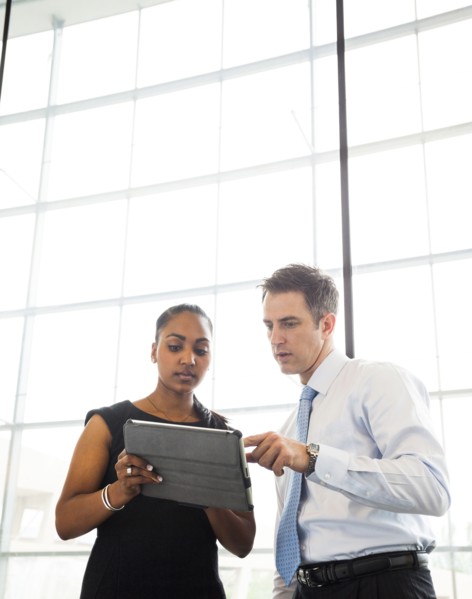 Business people using digital tablet