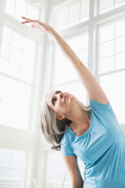 Caucasian woman practicing yoga