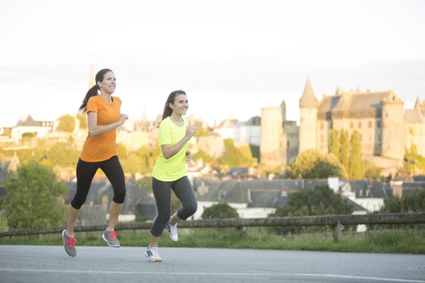 Caucasian women jogging outdoors