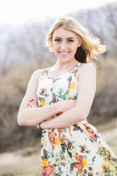 Caucasian teenage girl standing outdoors