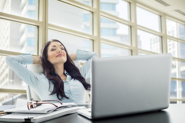Caucasian businesswoman unwinding in office