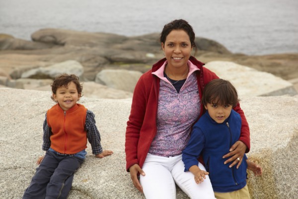 Mother and boys enjoying the beach