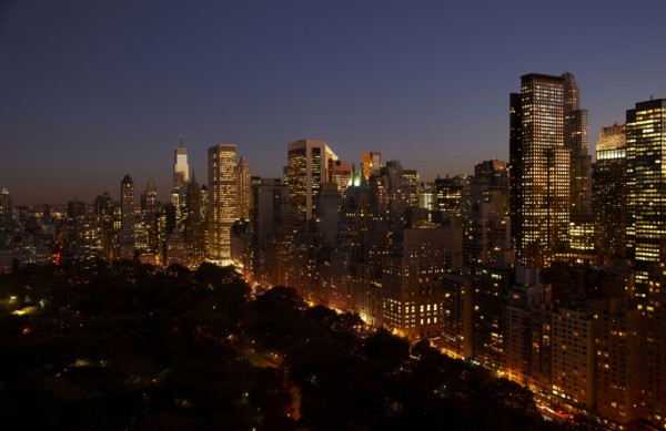 Sunset and illuminated cityscape