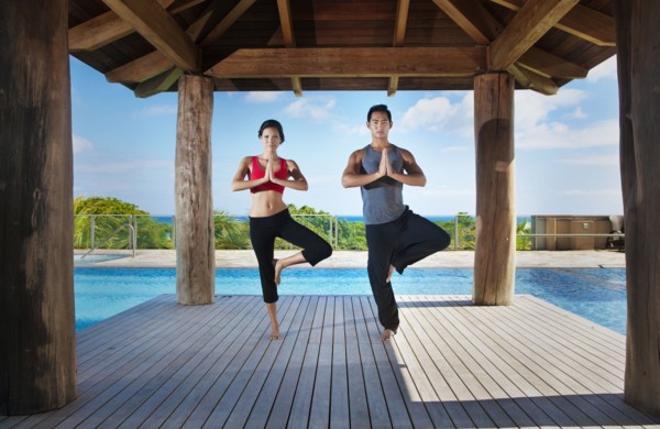 Couple practicing yoga together