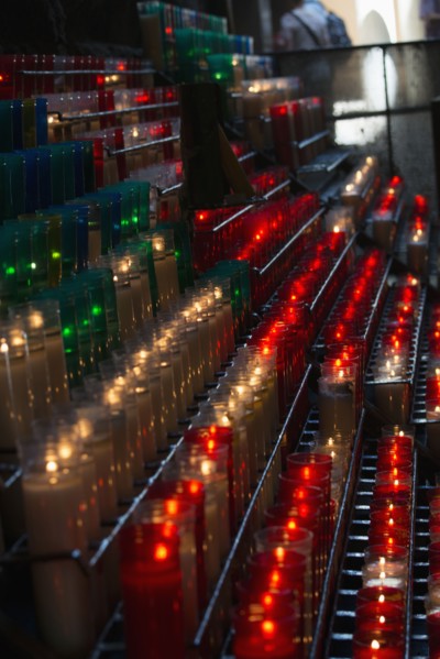 Lit candles in church