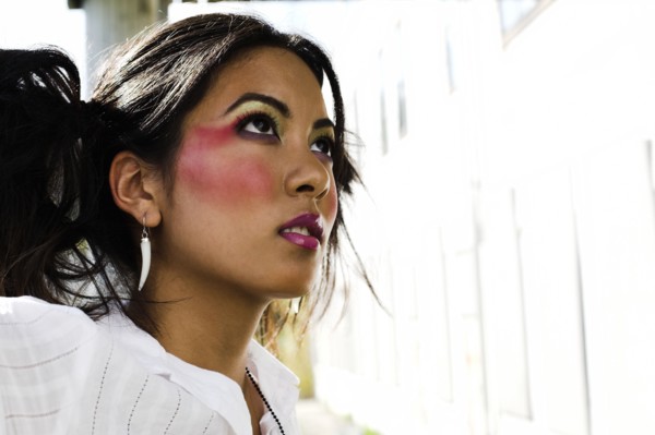 Young Asian woman wearing dramatic makeup