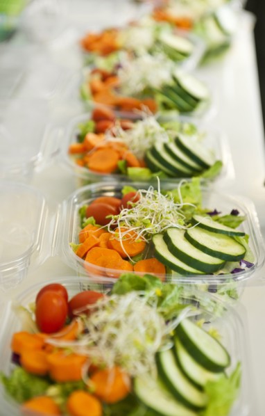 Sliced vegetables in plastic containers