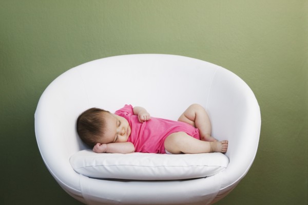 Baby sleeping on chair