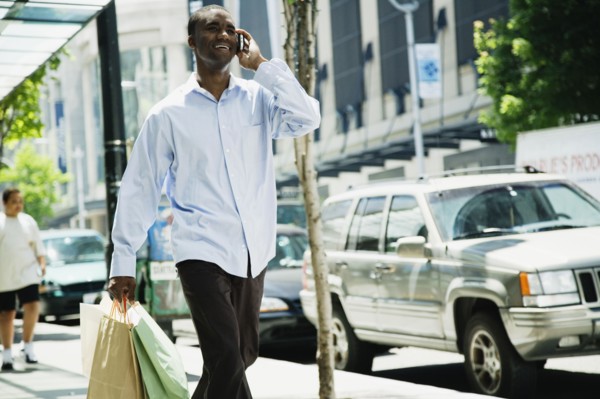 African man talking on cell phone