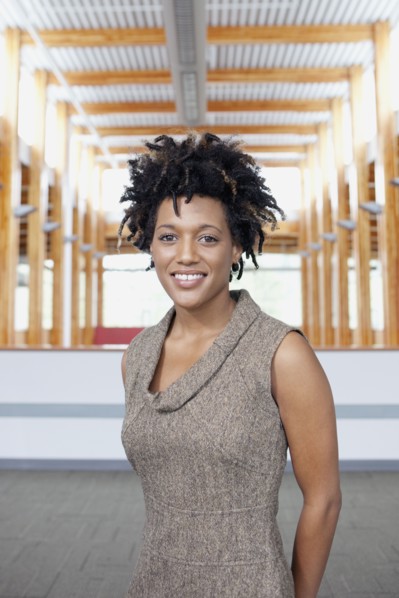 Mixed race businesswoman smiling