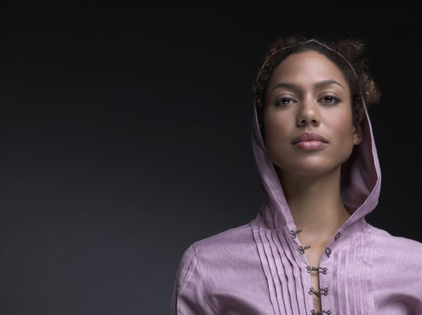 Mixed Race woman wearing hooded shirt