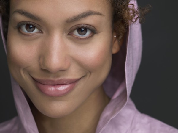 Mixed Race woman wearing hooded shirt