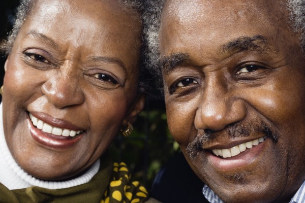 Close up of senior African couple smiling