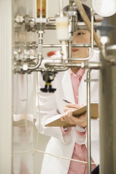 Chinese scientist checking gauge