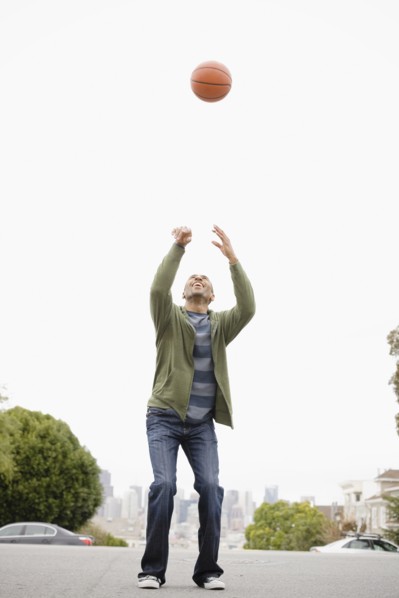 African American man playing basketball