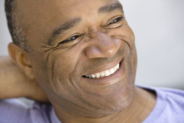 Smiling mixed race man