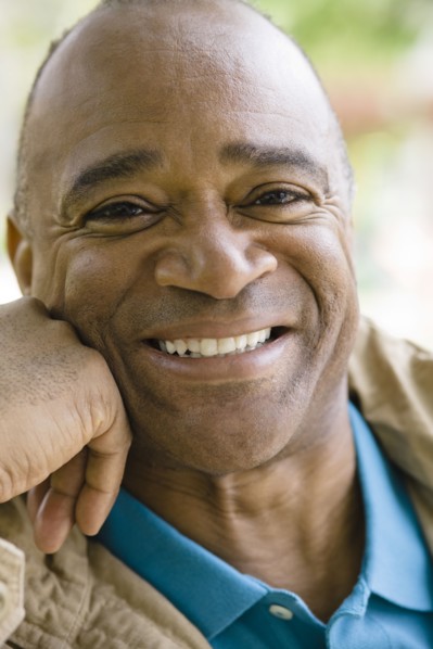 Smiling mixed race man