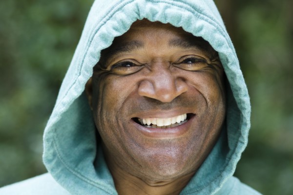 Smiling African American man in hoody