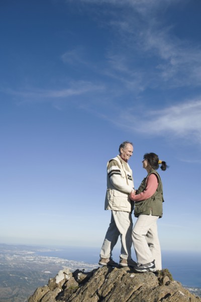 Senior couple on top of cliff
