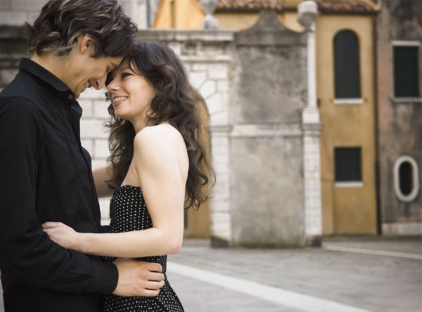 Italian couple hugging outdoors