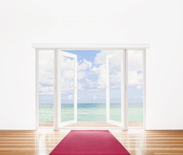 French doors opening onto beach