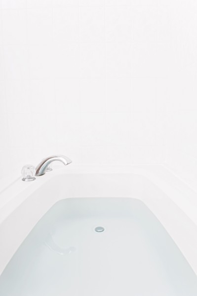 Faucet over full bathtub