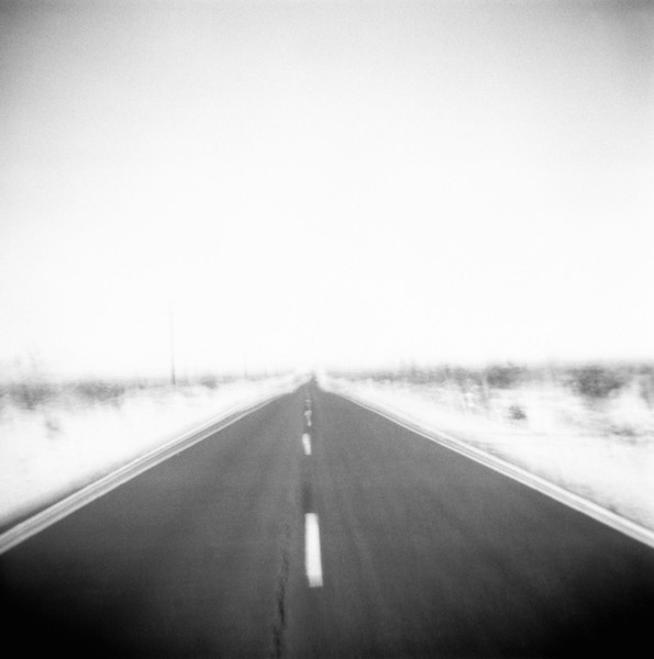 Defocused view of empty road
