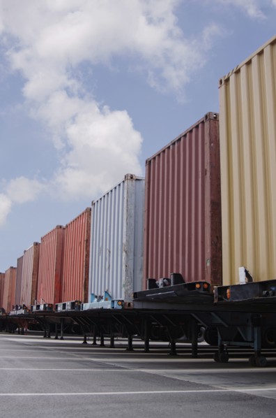 Cargo containers in parking lot