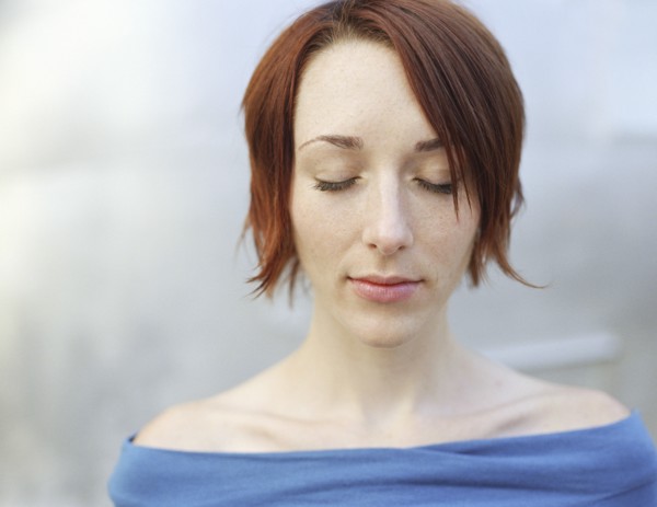 Caucasian woman with eyes closed