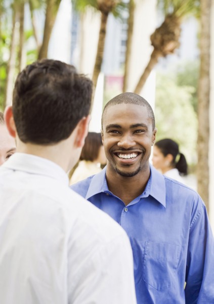 Smiling business people outdoors