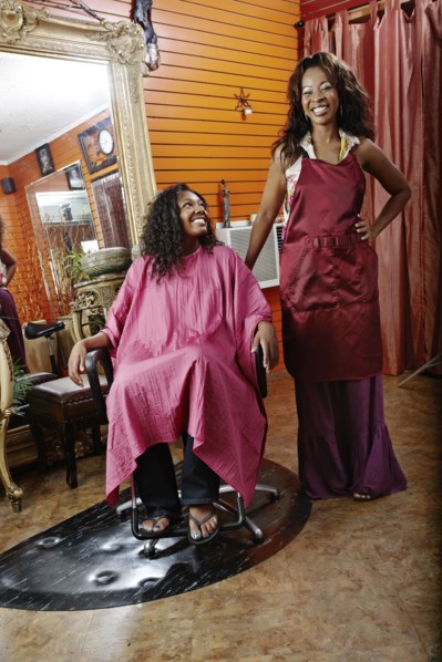 Woman having hair done in beauty salon