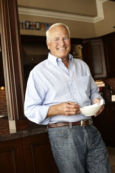 Caucasian man holding bowl