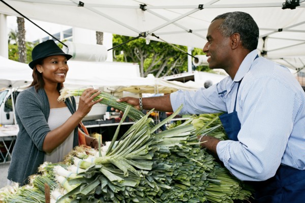 Black woman shopping at outdoor market