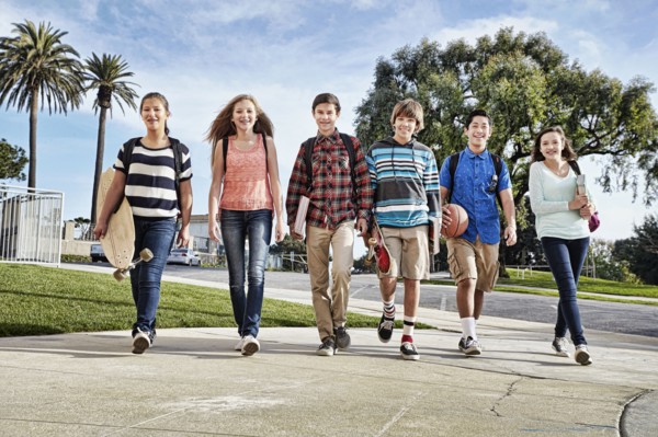 Teenagers walking to school