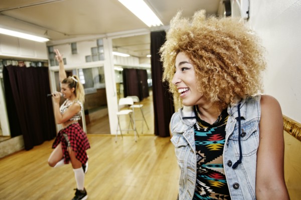 Dancer and singer rehearsing in studio