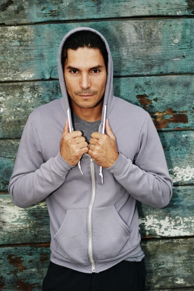 Mixed race man wearing hoody