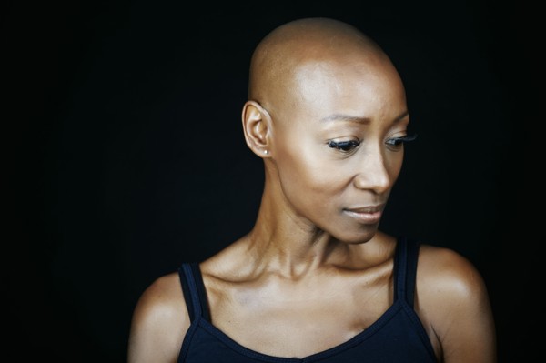 Close up of face African American woman looking down