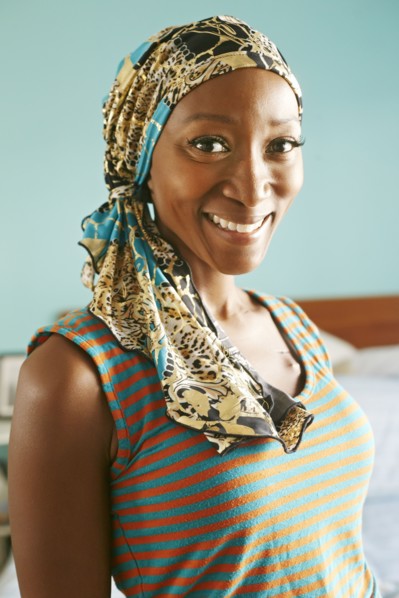 Smiling African American woman wearing headscarf