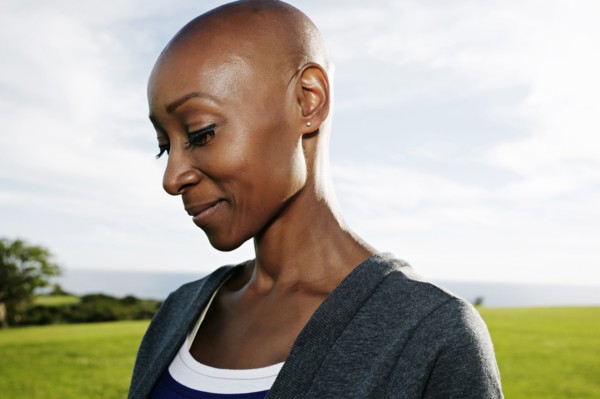 African American woman smiling in park