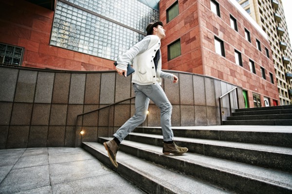Caucasian businessman walking on steps