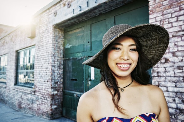 Japanese woman smiling outdoors
